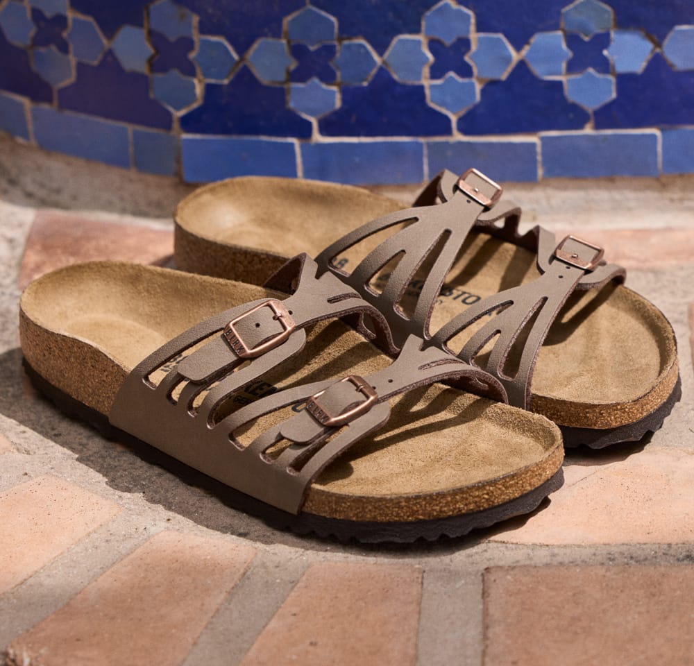 Women's Birkenstock Granada 2 Buckle Slide sandal in brown.