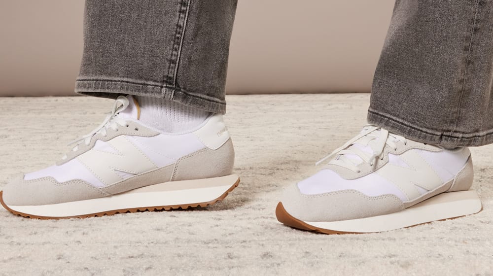 Women's New Balance 237 Classic Runner sneaker in tan. 