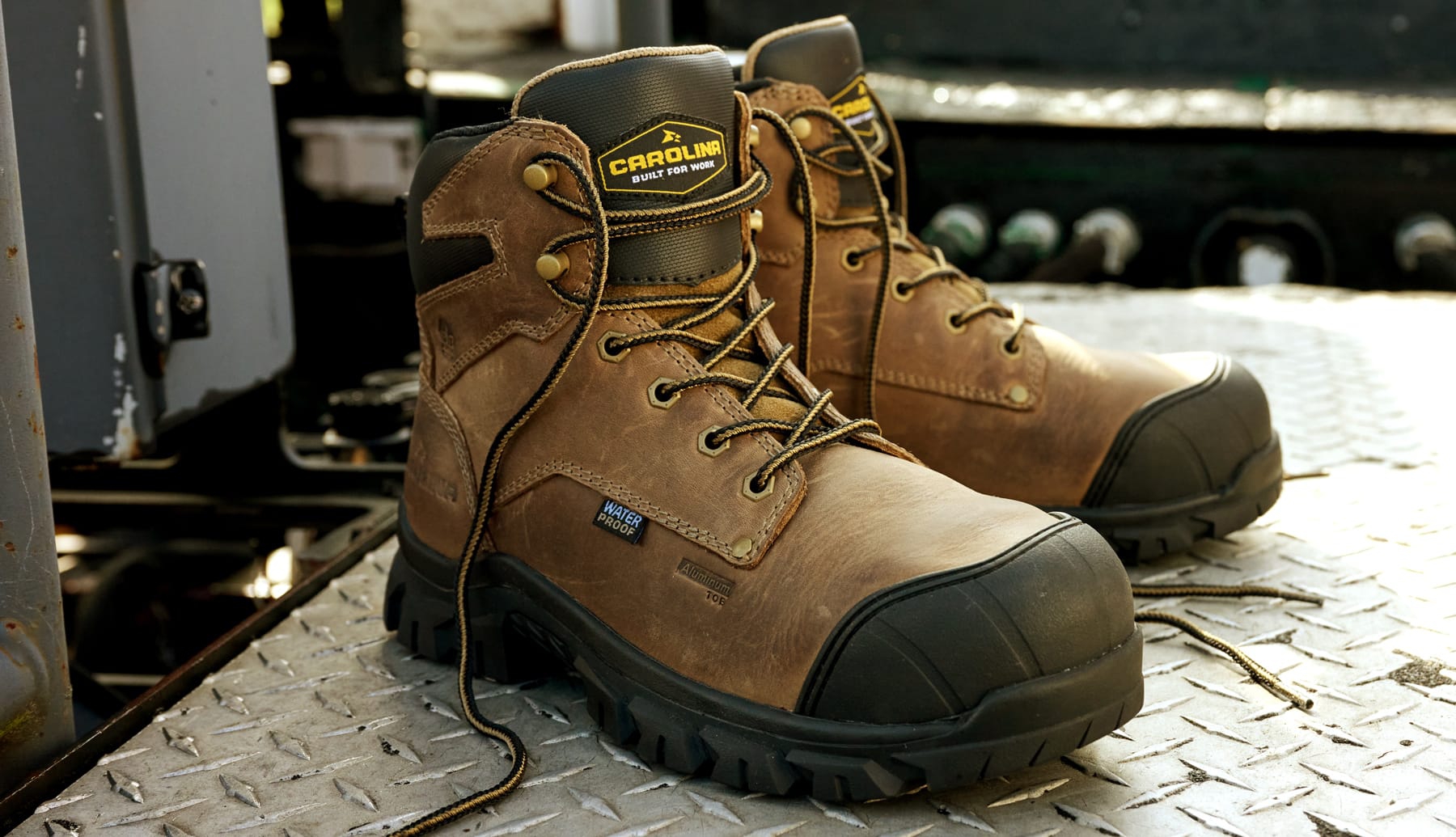 Men's Carolina 6 Inch Waterproof Alum Toe Puncture Resist Gruntz lace-up work boot in brown.
