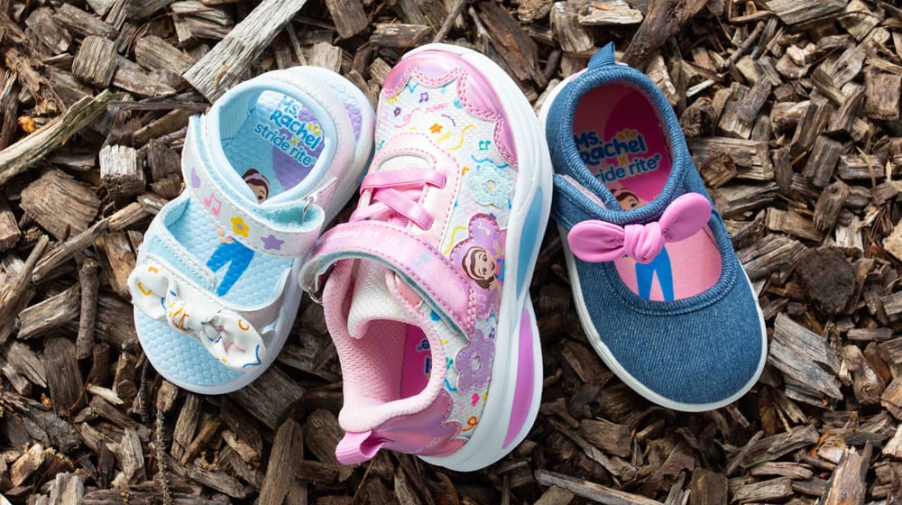 Assortment of girls' shoes in blue and pink.