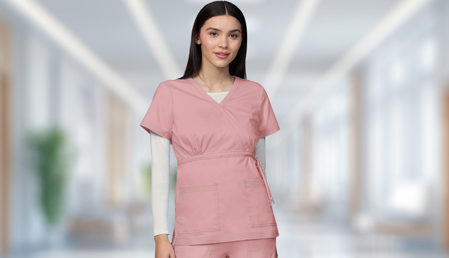 Women's Koi Katelyn Mock Wrap top in pink. 