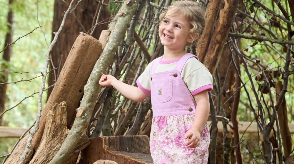Infant's Girl Carhartt Short Sleeve Onesie & Chambray Jumper Set in pink and white.
