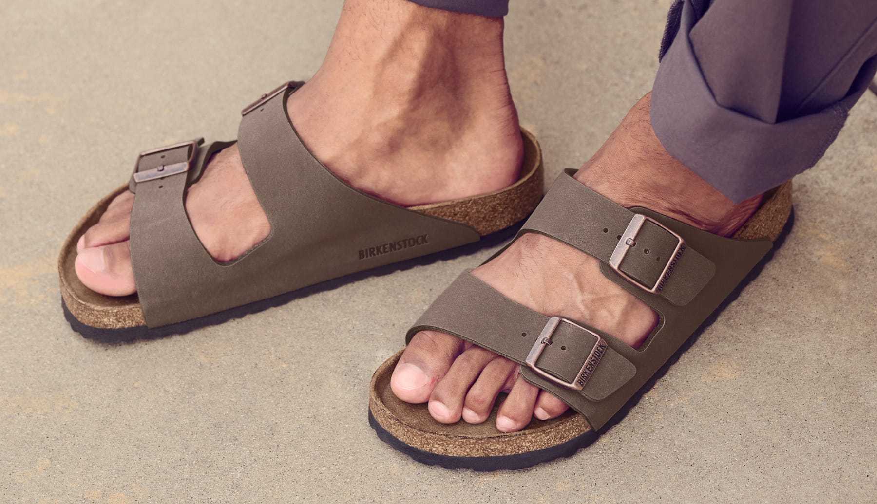 Men's Birkenstock Arizona 2 Strap slide sandal in brown.