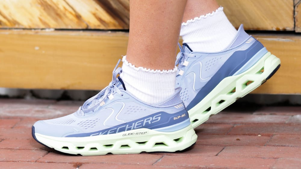 Women's Skechers Slip-Ins Glide Step sneakers in light blue.