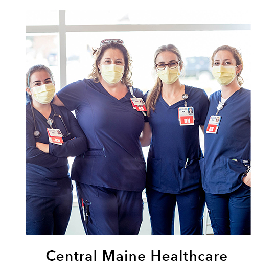 Central Maine Healthcare.  Four health care workers shown wearing navy scrubs