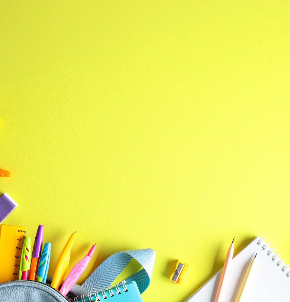 Various classroom supplies: paints, paper, pens, pencils, etc.