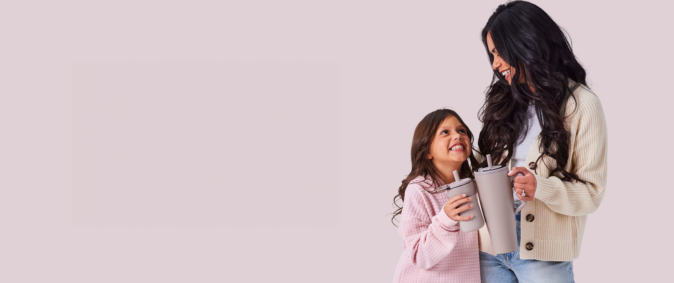 Featured styles: BruMate Era 40 oz Straw Tumbler and BruMate Leap 12 oz Straw Tumbler in light purple.