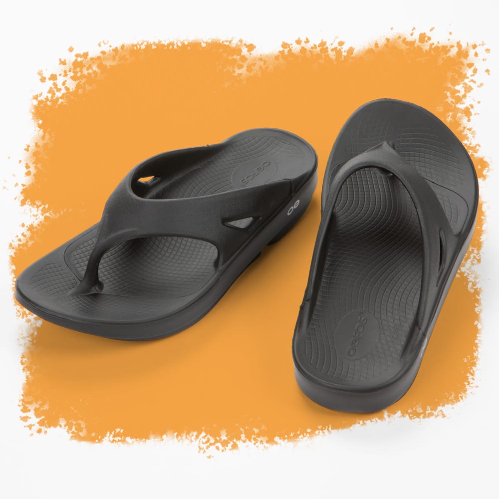 Featured style: Men's Oofos Ooriginal thong sandal in black.